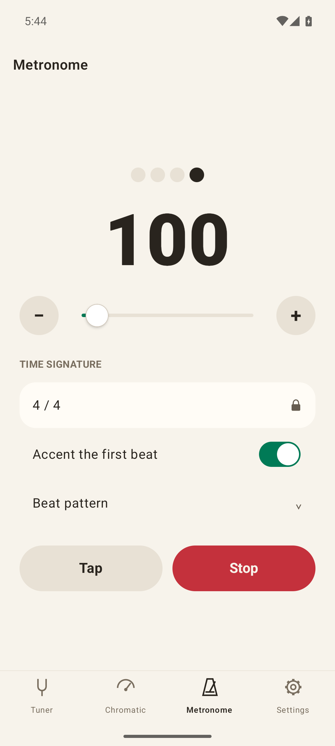 The metronome screen with a tempo of 100, a 4/4 time signature, beat lights, and tap-tempo controls.